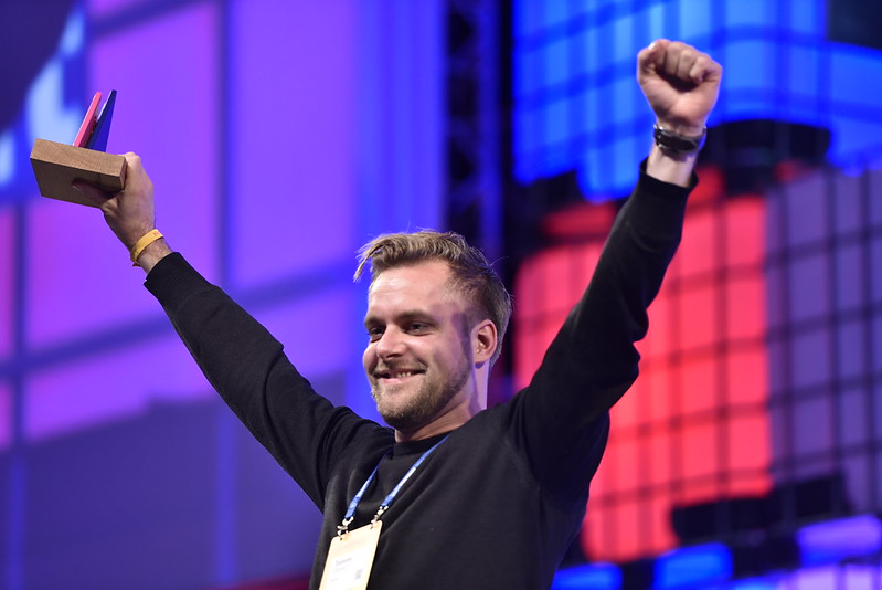 Kubo Robotics co-founder and CEO Tommy Otzen celebrates with arms in air after winning PITCH at Web Summit 2016.