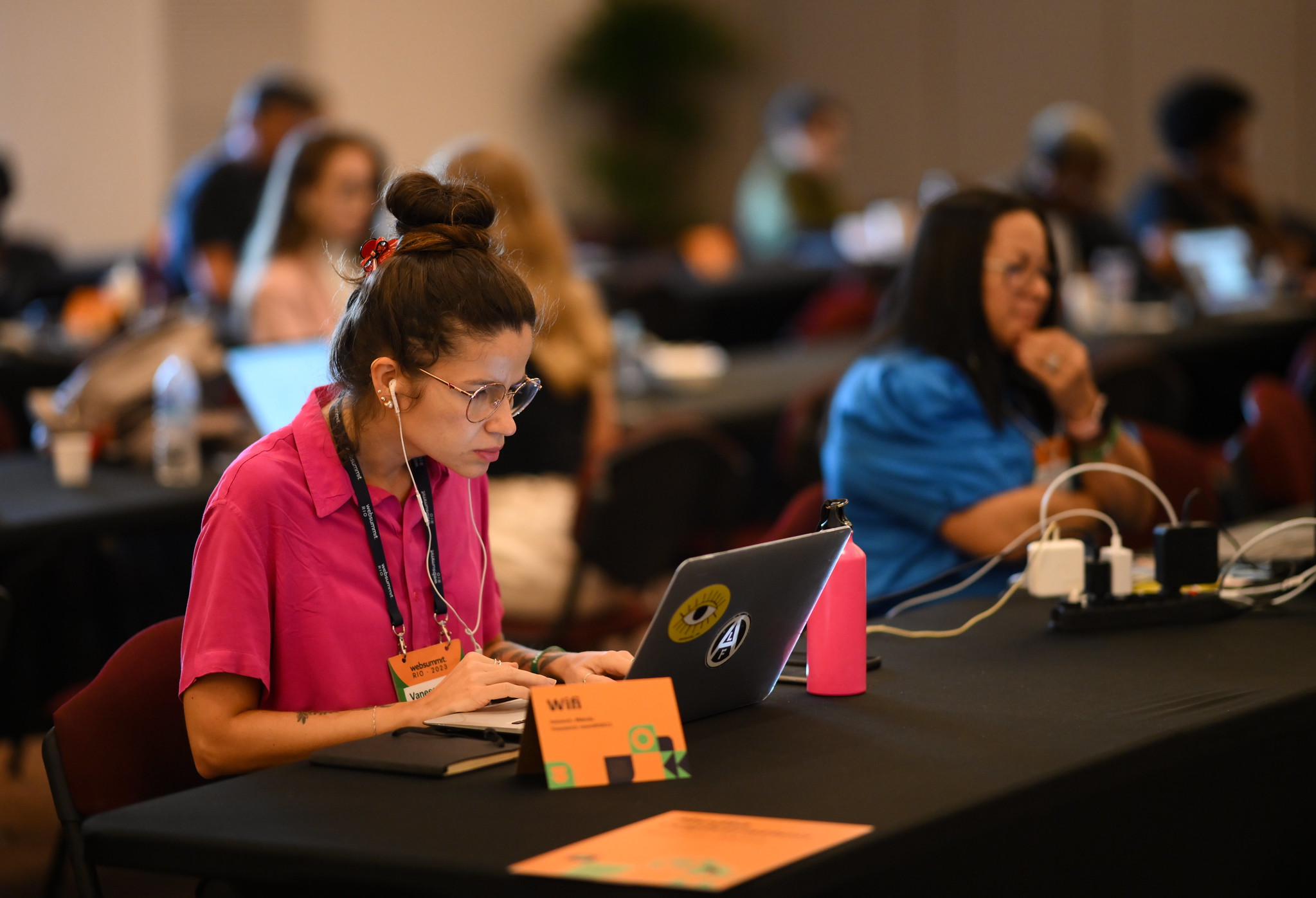 Journalists works at media village during Web Summit Rio 2023