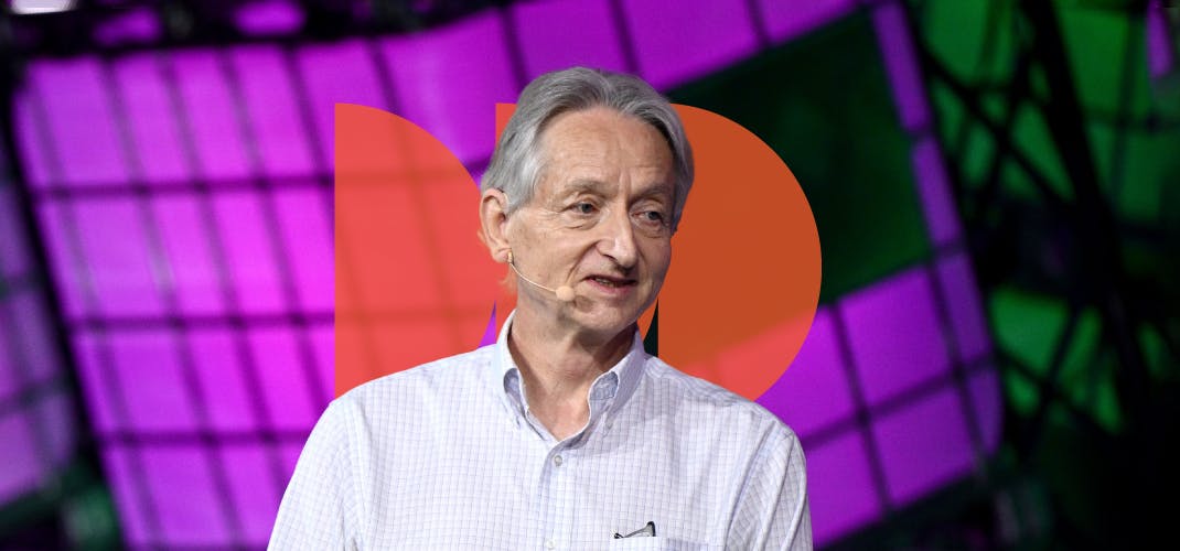 A person (renowned AI researcher Geoffrey Hinton) visible from the chest up. They are wearing a headset mic and appear to be speaking. Behind them is a wall of large cuboid water containers, lit from within. A slightly transparent illustration of three orange semicircles is partially visible in the centre of the image, behind the person's head.