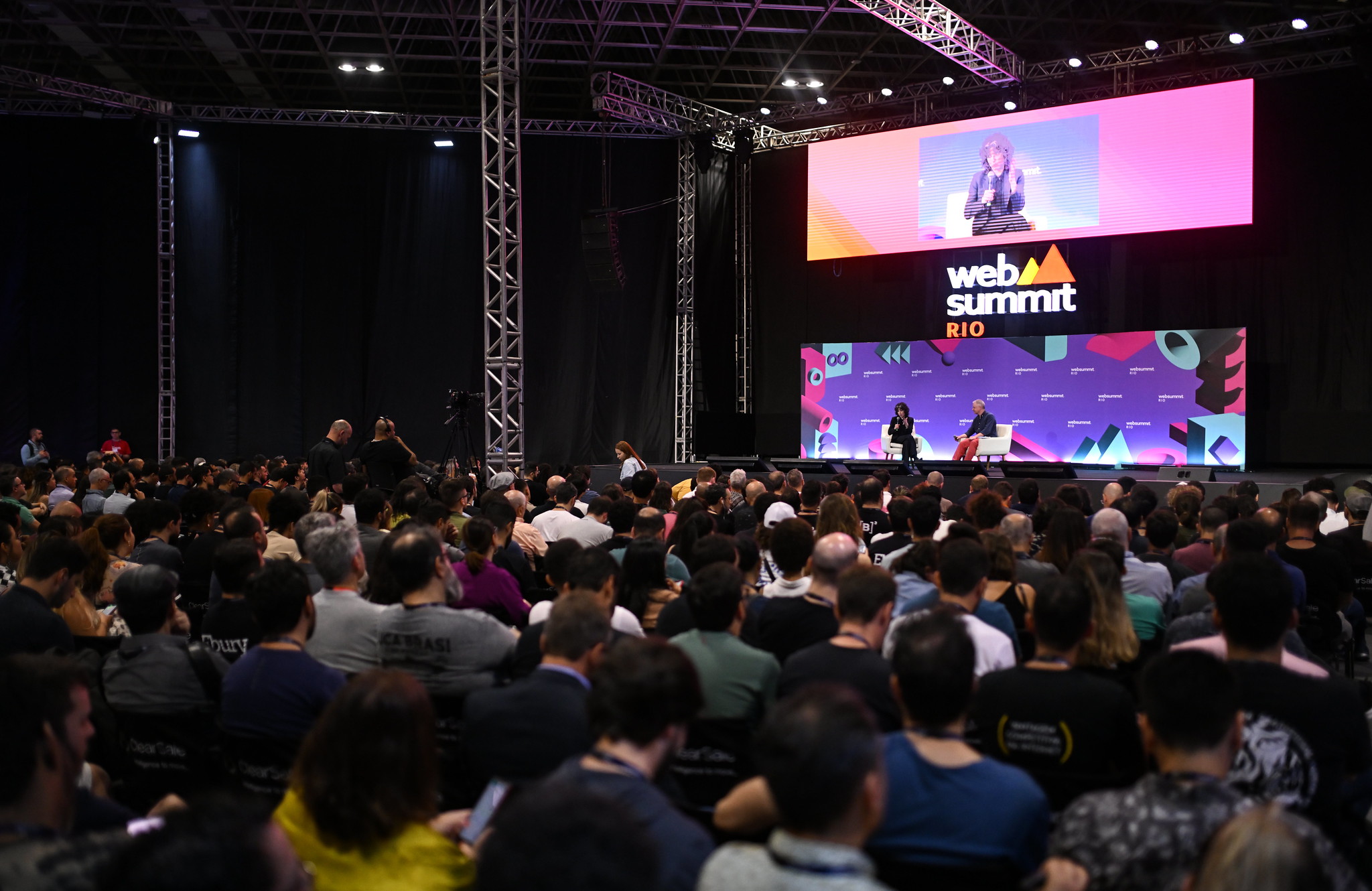 Meredith Whittaker, President, Signal, left, and Rob Pegoraro, Contributor, Fast Company, on FullSTK Stage during day two of Web Summit Rio 2023 at Riocentro in Rio de Janeiro, Brazil.